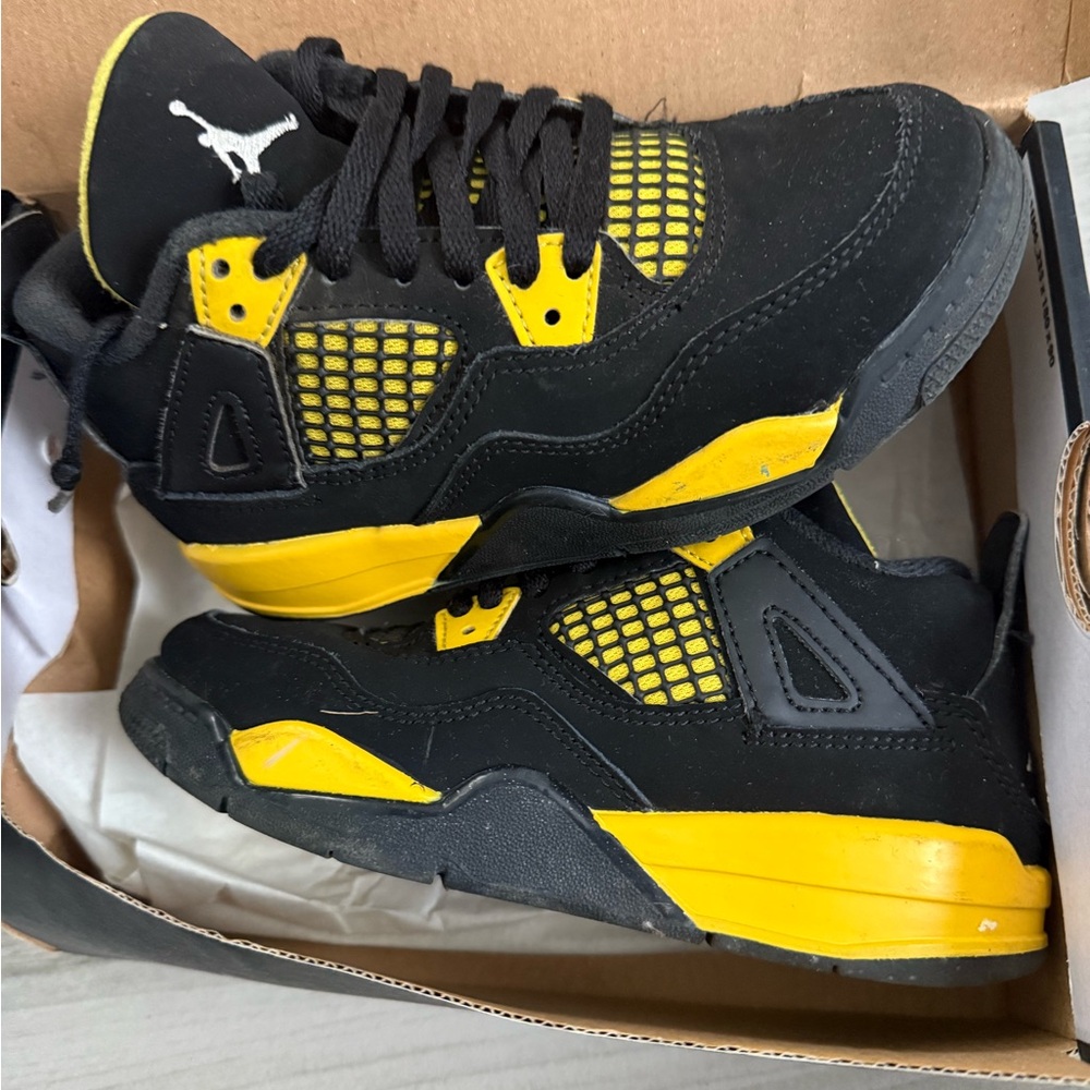 Jordan 4 Retro Black and Tour Yellow